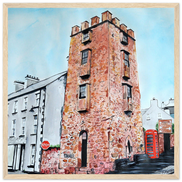 Framed art print 'The Curfew Tower' by Ó Maoláin. This piece depicts The Curfew Tower in Cushendall, Glens of Antrim, built by Francis Turnley in 1820 and now owned by Bill Drummond. The artwork showcases the tower amid the scenic Glens of Antrim.