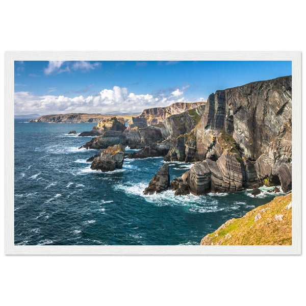 Captivating framed print of Mizen Head, County Cork, Ireland. Features dramatic Atlantic coast, towering cliffs, and raw power of ocean. Perfect decor for nature lovers.