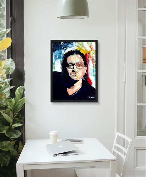 Framed wall art print of Bono from U2 by Irish artist Ó Maoláin. This vibrant, colorful portrait captures Bono's legendary stage presence, adding rock 'n' roll flair to your decor. A perfect statement piece for U2 fans, blending music and art seamlessly.