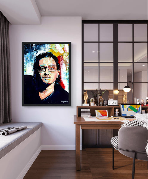 Framed wall art print of Bono from U2 by Irish artist Ó Maoláin. This vibrant, colorful portrait captures Bono's legendary stage presence with dynamic energy and vivid colors, adding rock 'n' roll flair to your space. Perfect for U2 fans and art lovers alike.
