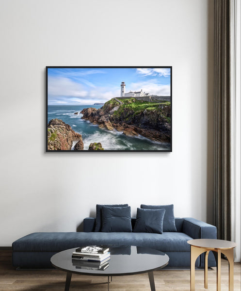 Capture the breathtaking beauty of Fanad Head Lighthouse in Co. Donegal, Ireland with our framed print. This captivating piece beautifully portrays the iconic landmark, offering a slice of Ireland&#39;s rugged coastal charm for your home decor.