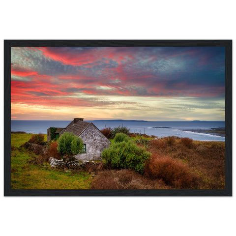 Wall art print of a serene sunset over the Atlantic Ocean in Doolin, Co. Clare, Ireland. Includes a charming cottage amidst coastal scenery, capturing the tranquil beauty of Ireland's west coast.