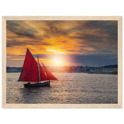 Detailed framed print of a Galway Hooker, a traditional Irish fishing boat, against a scenic coastal backdrop. Rich colors and intricate details evoke maritime nostalgia and charm