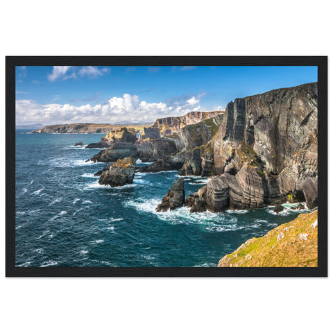 Captivating framed print of Mizen Head, County Cork, Ireland. Depicts dramatic Atlantic coast, towering cliffs, and raw ocean power. Perfect décor for nature lovers.