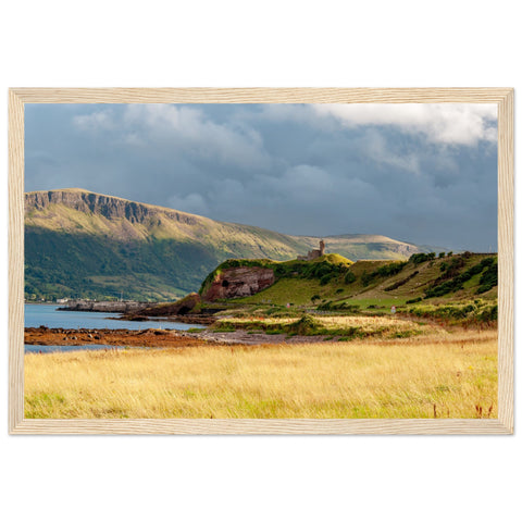 A framed print featuring Red Bay Castle against dramatic cliffs along County Antrim's coast, capturing rugged beauty and historical significance.