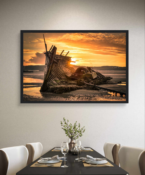 Capture the rugged beauty of the Wild Atlantic Way with our framed print of Bád Eddie shipwreck at sunset on Donegal's Bunbeg coast. Embrace Ireland's culture and scenery in your space today