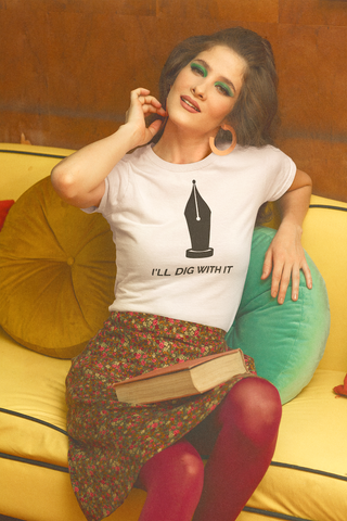 Seamus Heaney-inspired T-shirt with I'll Dig with it text. Made from premium cotton, featuring earthy colors and tasteful typography. Perfect for literature lovers and gardeners. Available in various sizes for a comfortable fit. A unique and thoughtful gift.